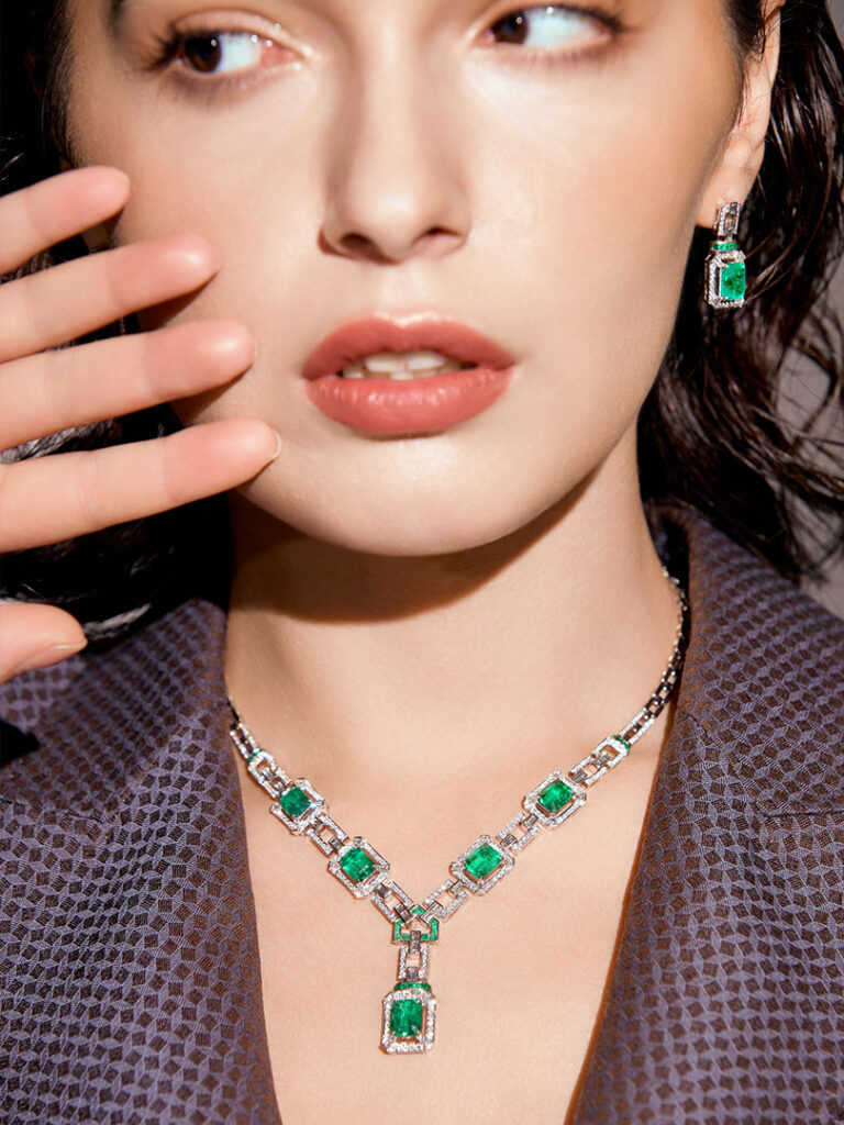 B2B wholesale jewelry sourcing in China featuring a model wearing symmetrical Art Deco floral jewelry from the Fantastic Garden Part 2 collection.